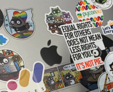 Jack's laptop featuring stickers